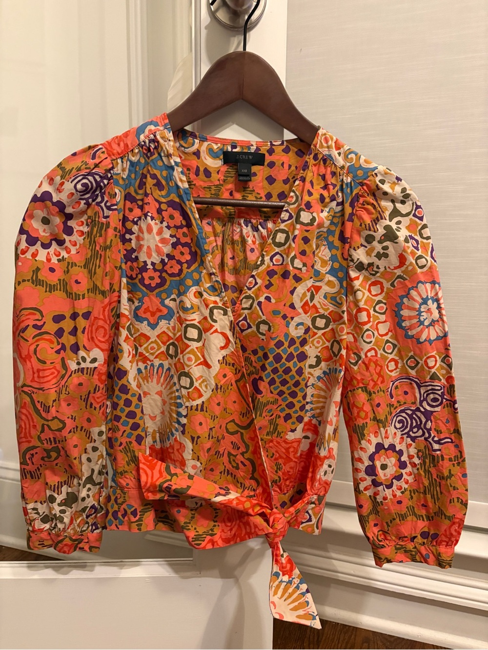 J.Crew wrap top size 00, button to secure wrap and hook at neckline